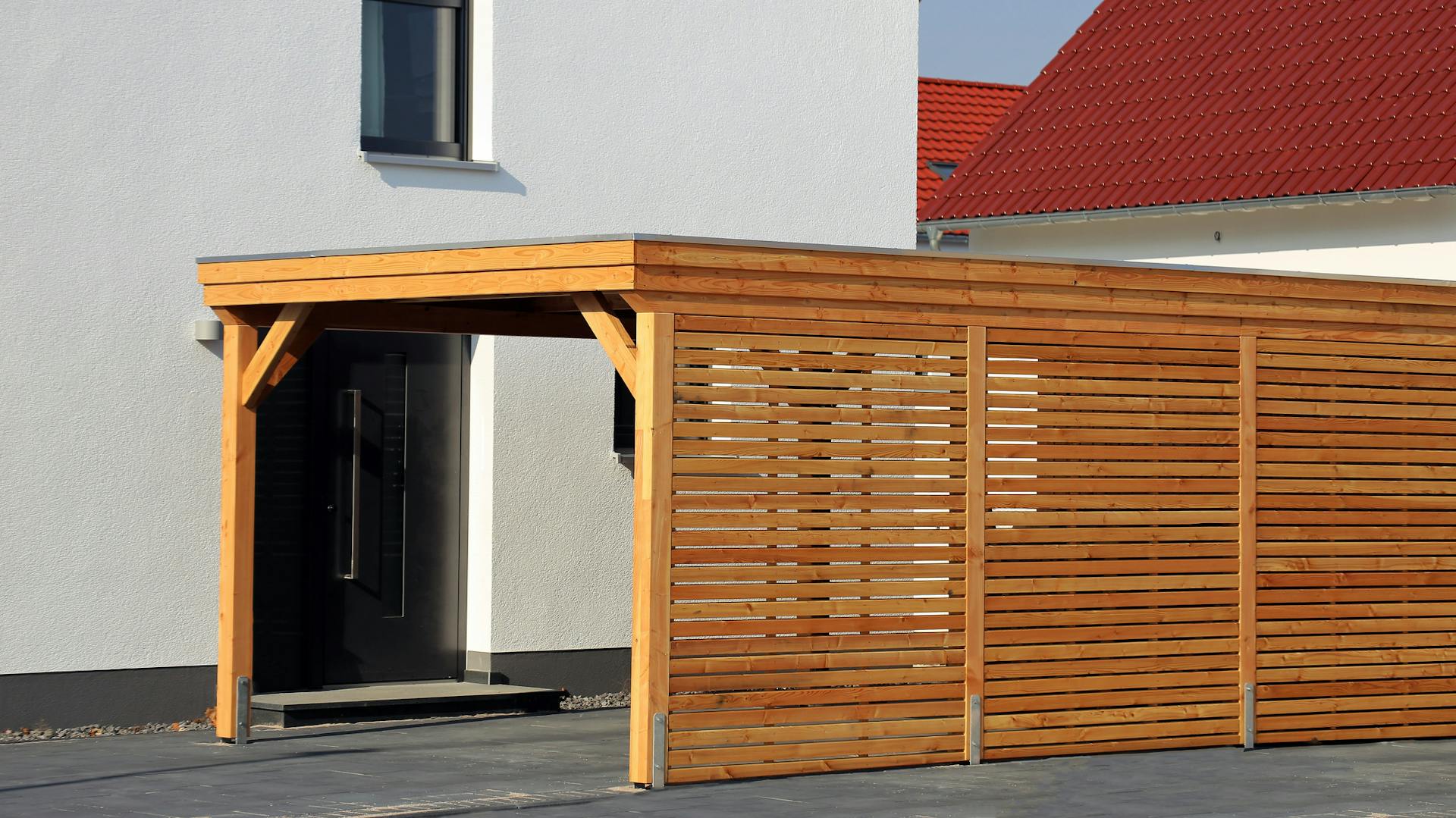 Carport aus Holz mit Flachdach
