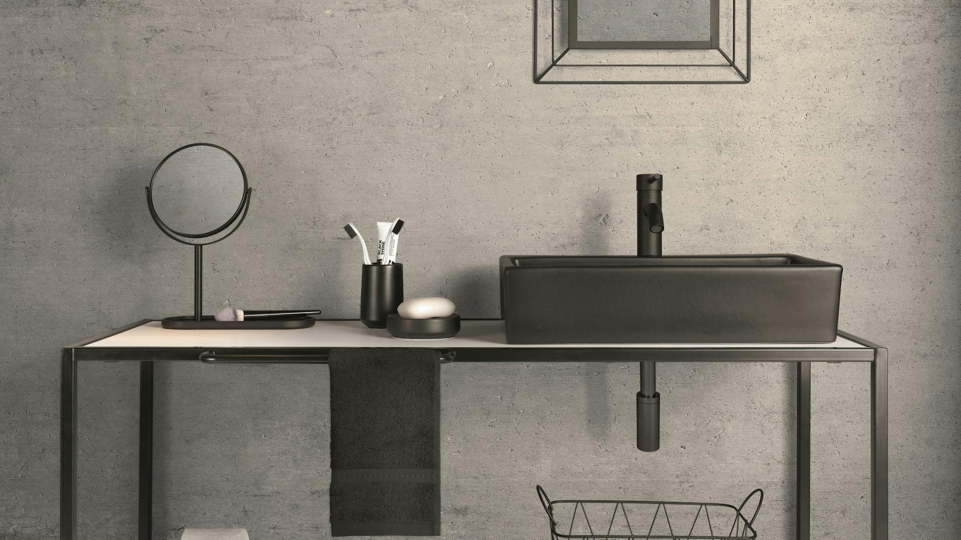 Waschtisch in schwarz-matt im Beton-Bad