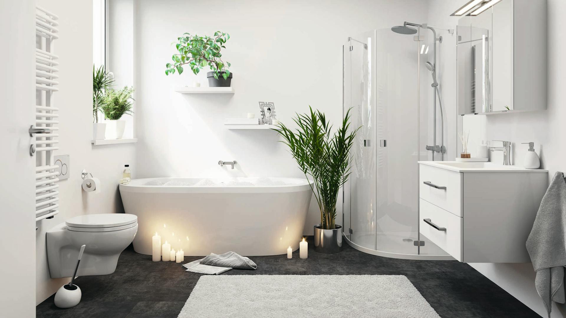 Bagno grigio-bianco con sanitario, vasca da bagno freestanding, lavabo e mobile con specchio.