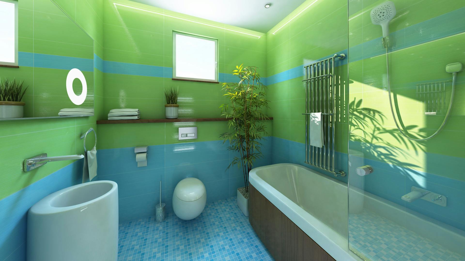 Badezimmer mit grünen und blauen Fliesen.