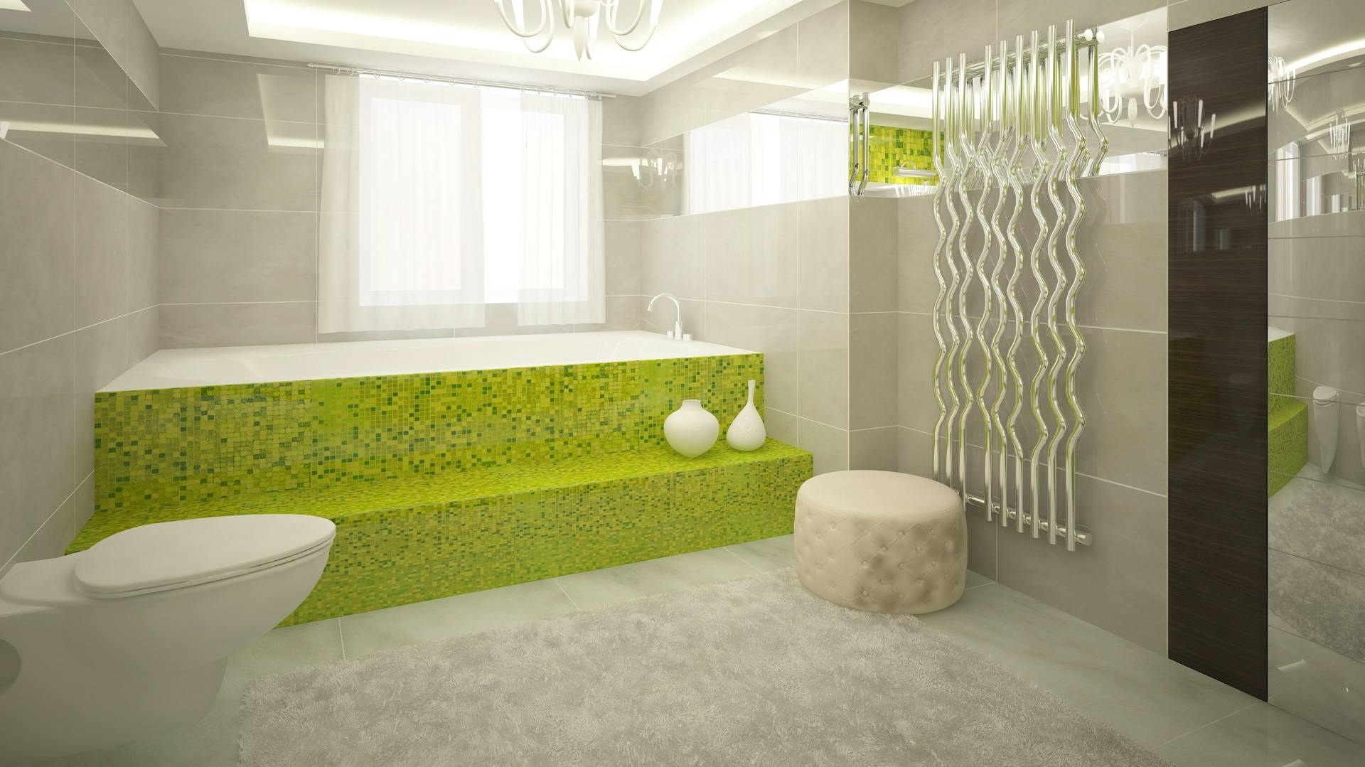 Weißes Bad mit grüner Badewanne.