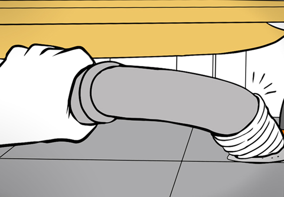 A barkácsoló csatlakoztatja a zuhanytálcát a lefolyóhoz.