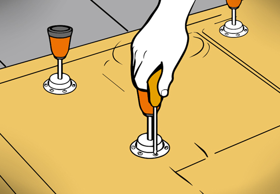 A barkácsoló felszereli a zuhanytálca lábait.