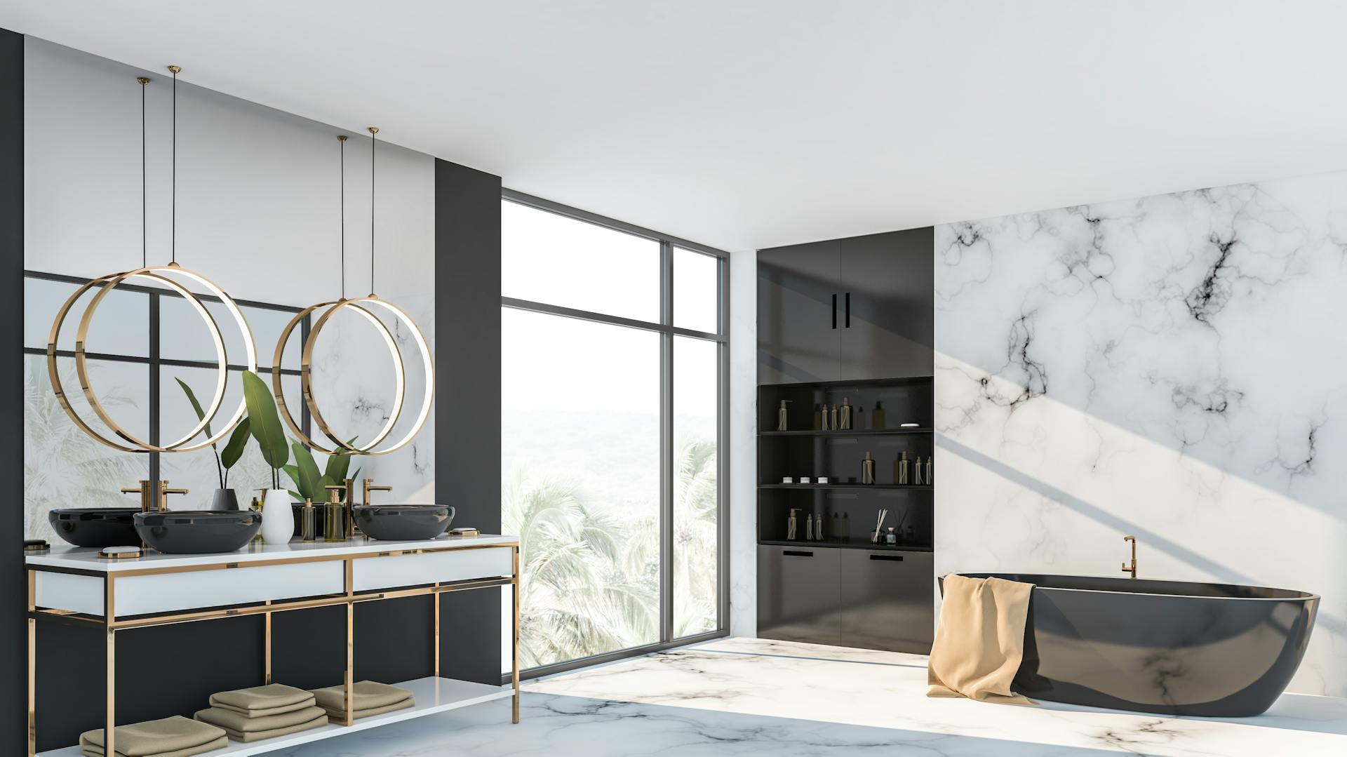 Mramor v kúpeľni skombinovaný so zlatými doplnkami.