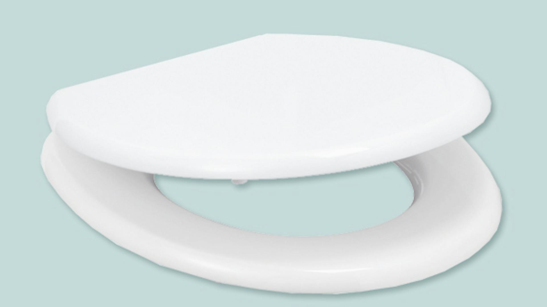 Weißer Toilettendeckel mit Absenkautomatik