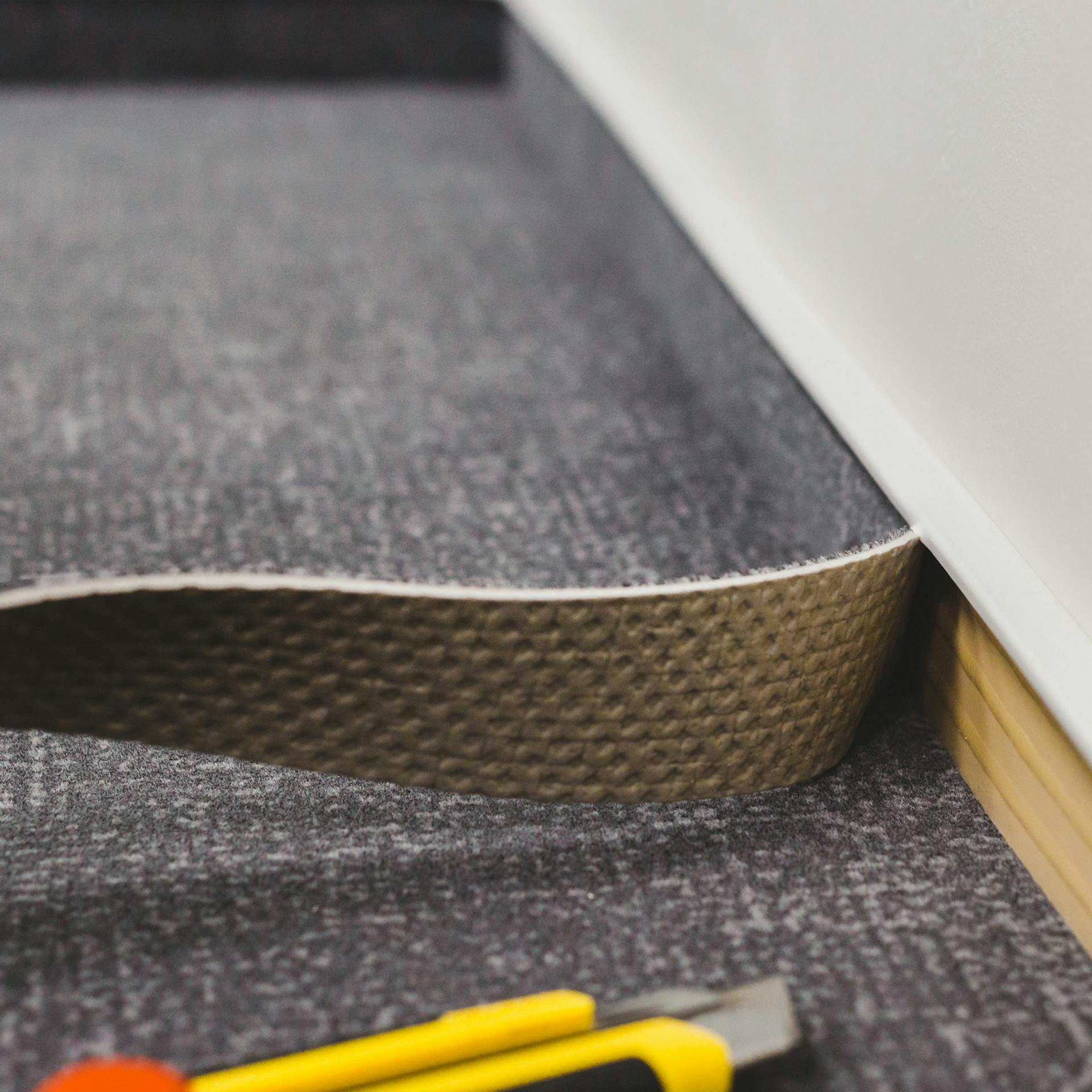 Szőnyeggel burkolt szegélyléc