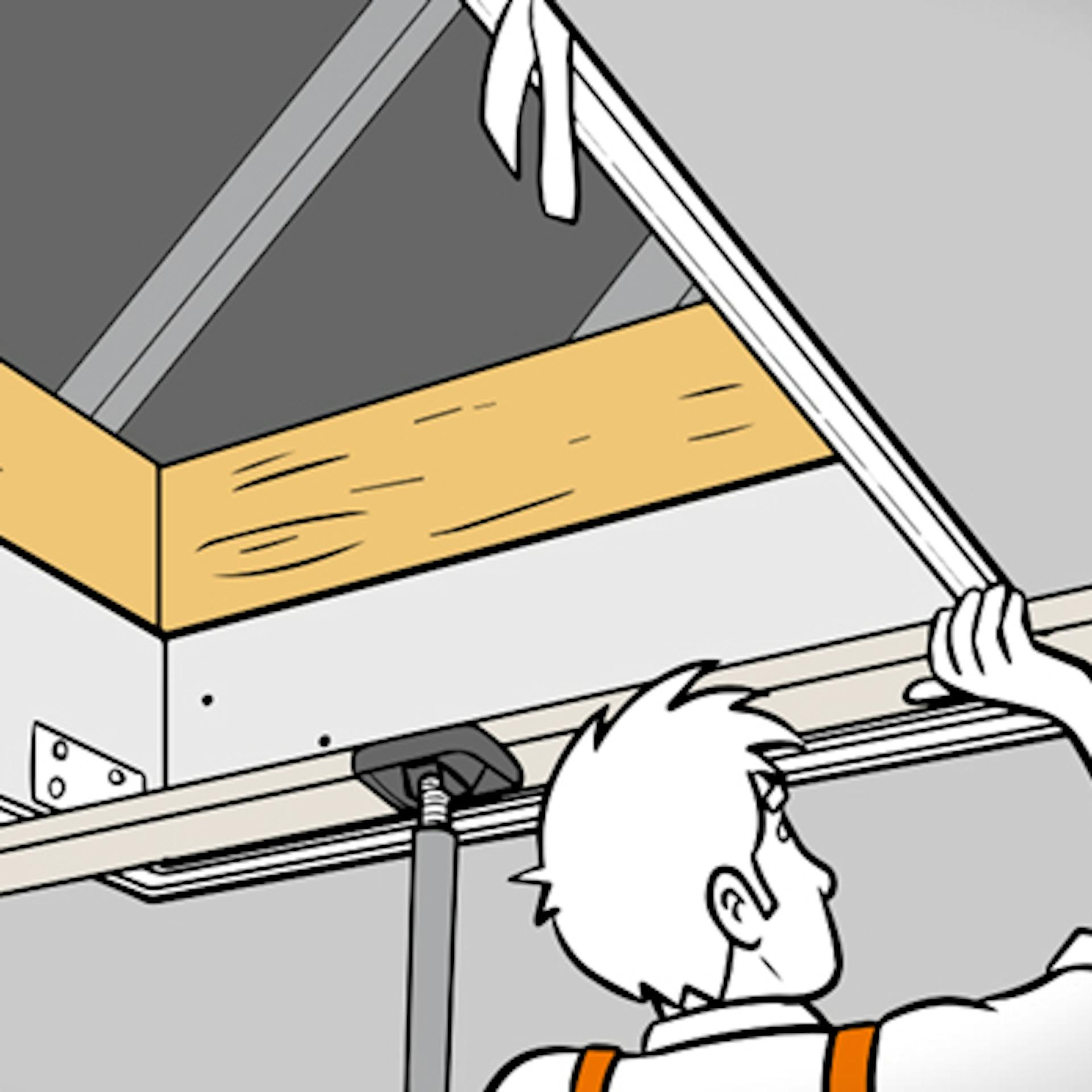 Heimwerker setzt Treppenkasten in Bodenöffnung ein.