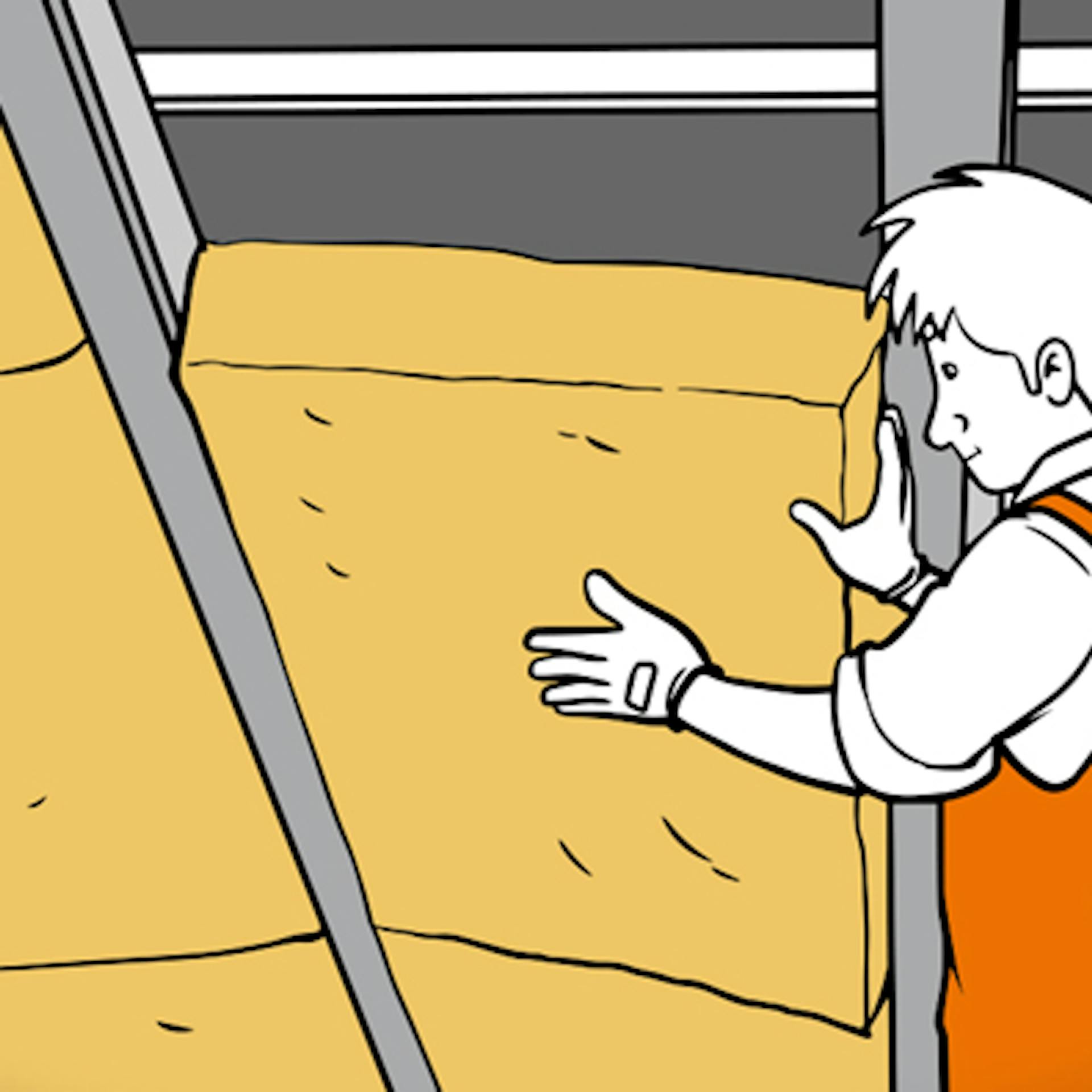 Dämmmaterial wird vom Heimwerker beim Dachdämmen angebracht.