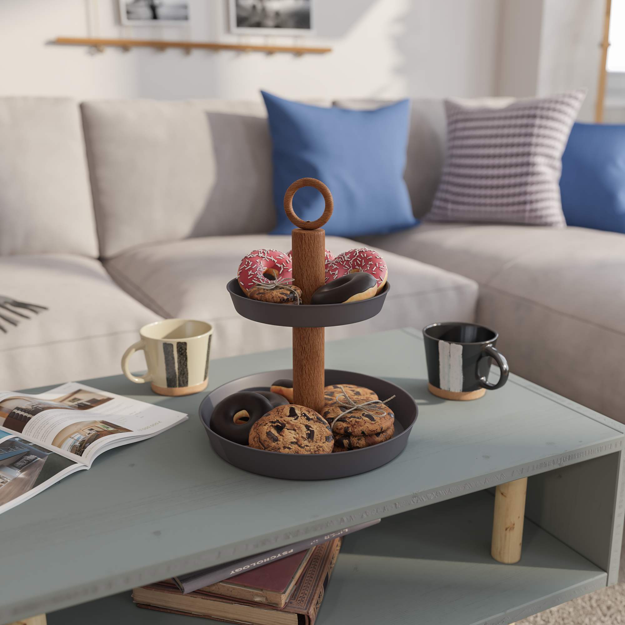 Tálalóállvány fánkokkal és süteményekkel.