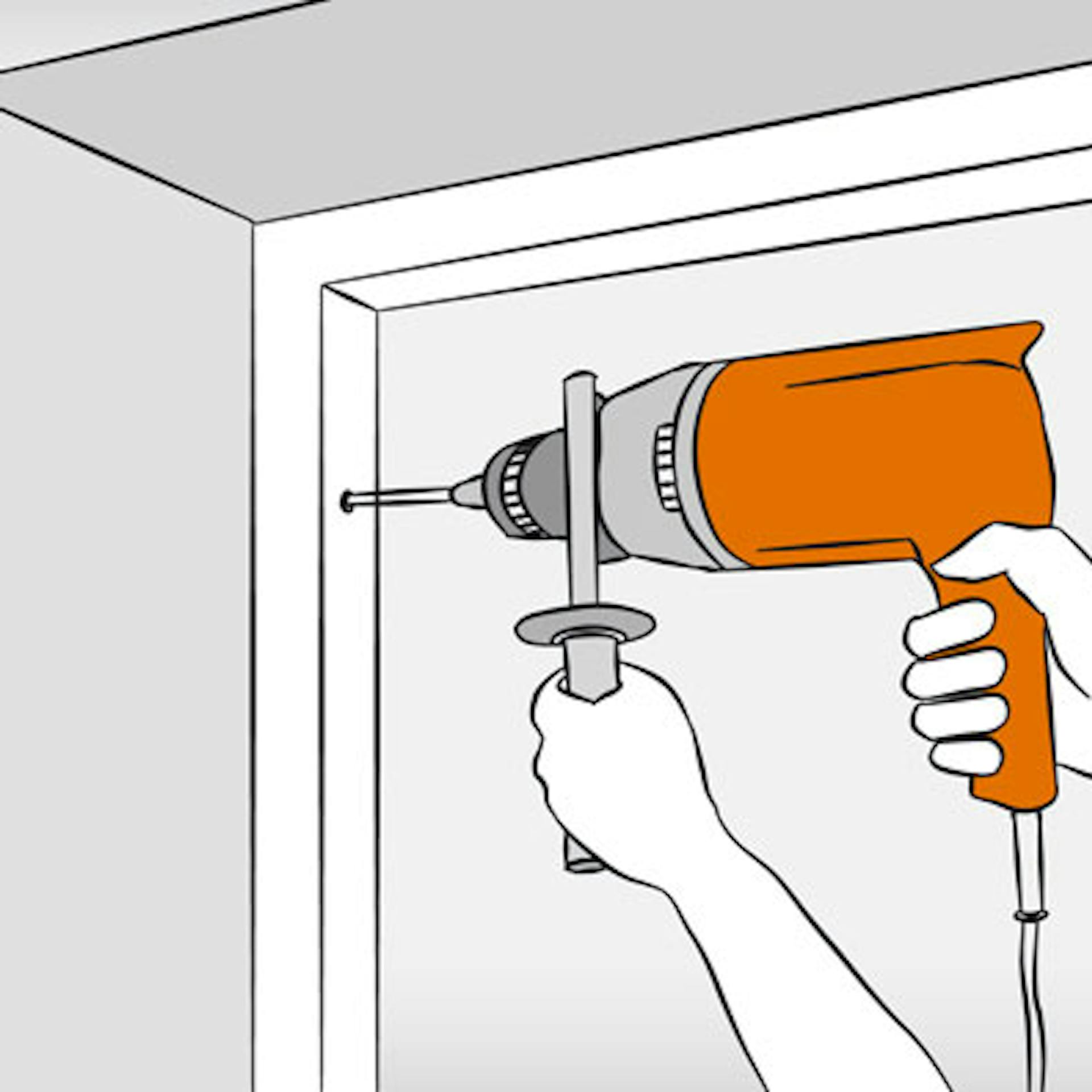 Bohren von Löchern für die Fensterrahmendübel.