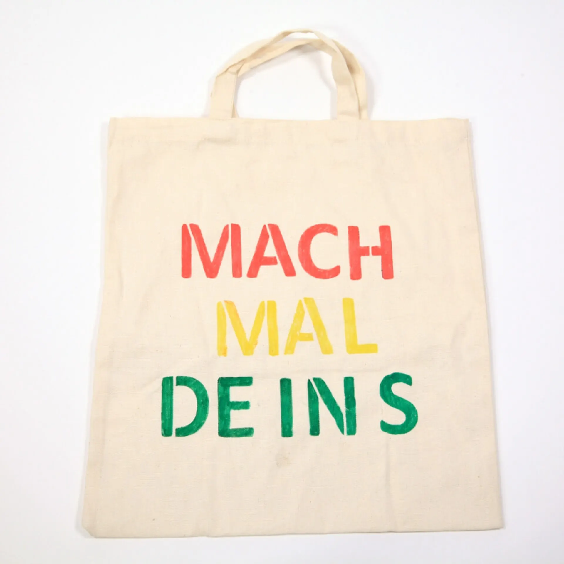 Selbstgestalteter Jutebeutel mit Aufschrift "mach mal deins"