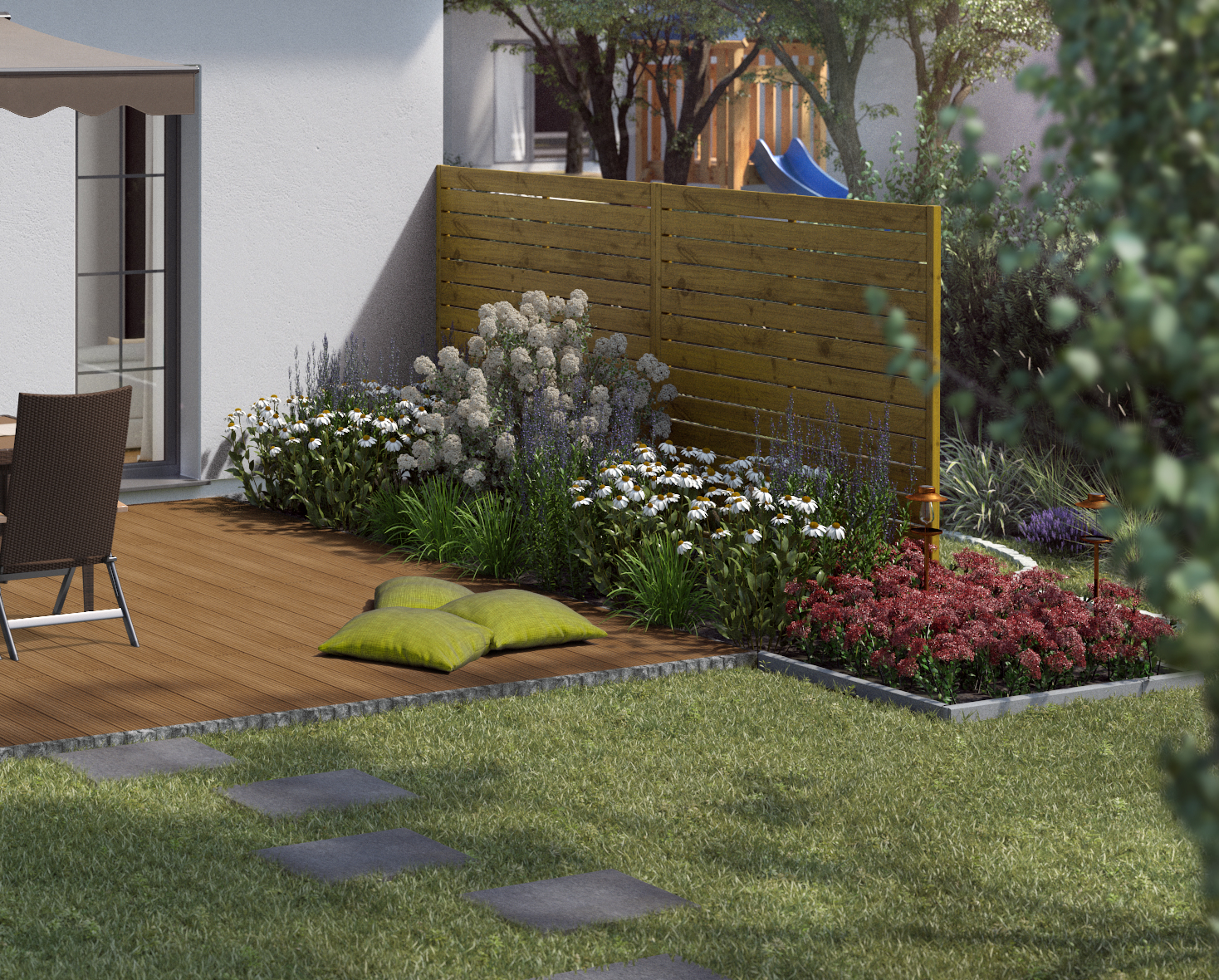 Ideen für die Gartengestaltung natürliche Terrasse mit Holzdielen und grünen Kissen neben natürlich bepflanzten Beeten an hohem Holzzaun als Sichtschutz
