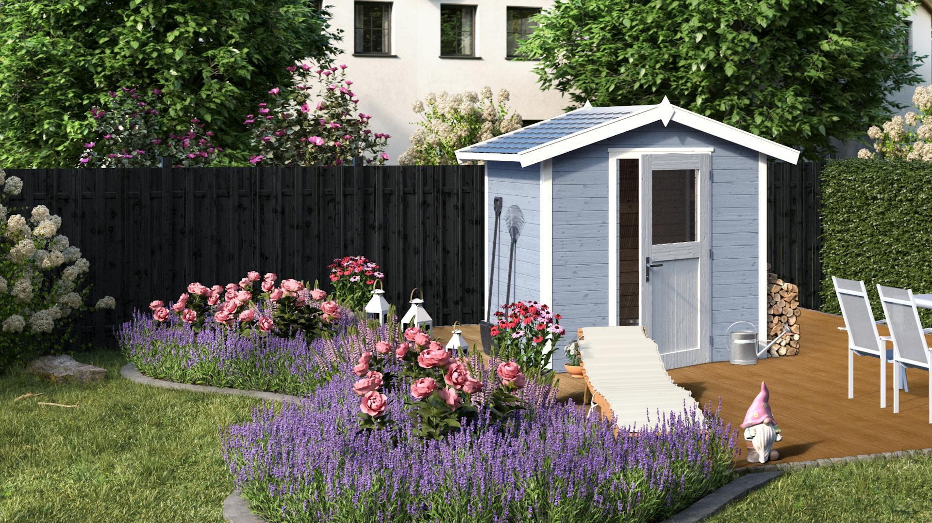 Ideen für die Gartengestaltung romantisches Gartenhaus in blau auf Holzboden an Beeten in Rosa- und Lilatönen