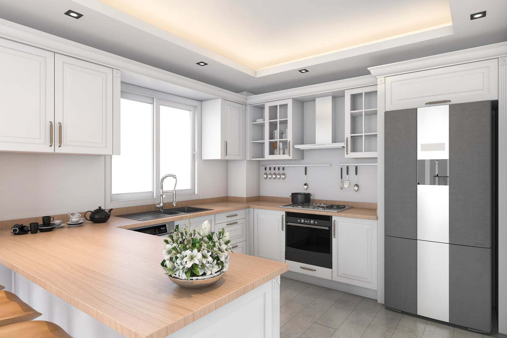 Cuisine en U avec des spots de plafond comme éclairage de fond