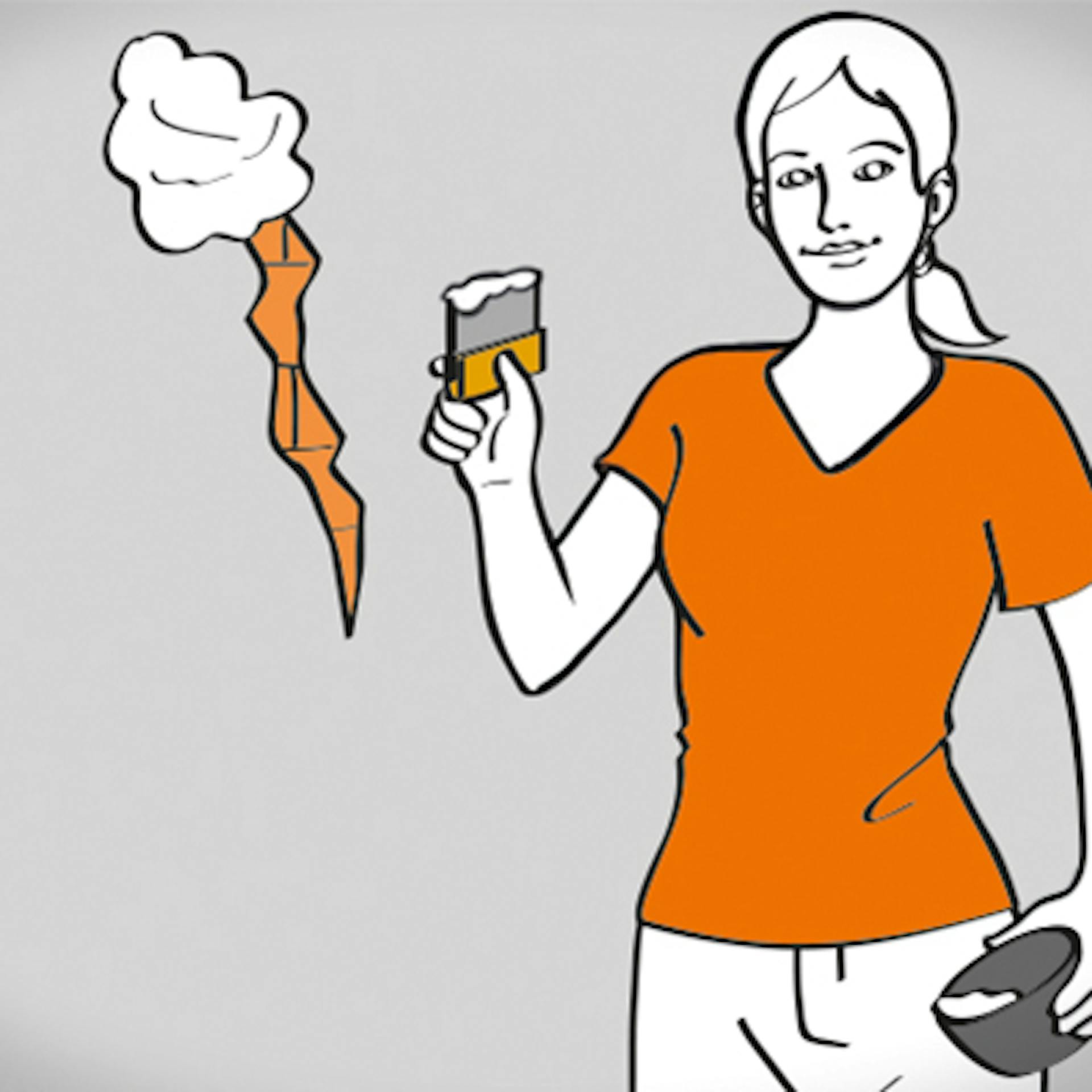 Heimwerkerin verspachtelt einen Riss in der Wand.