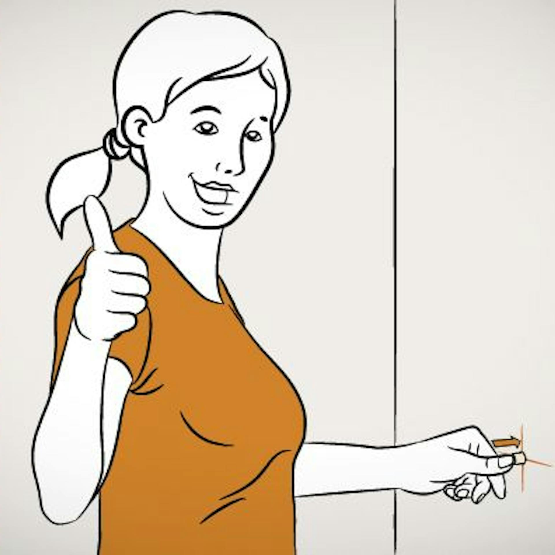 Heimwerkerin steckt Dübel in gebohrtes Loch in der Wand.