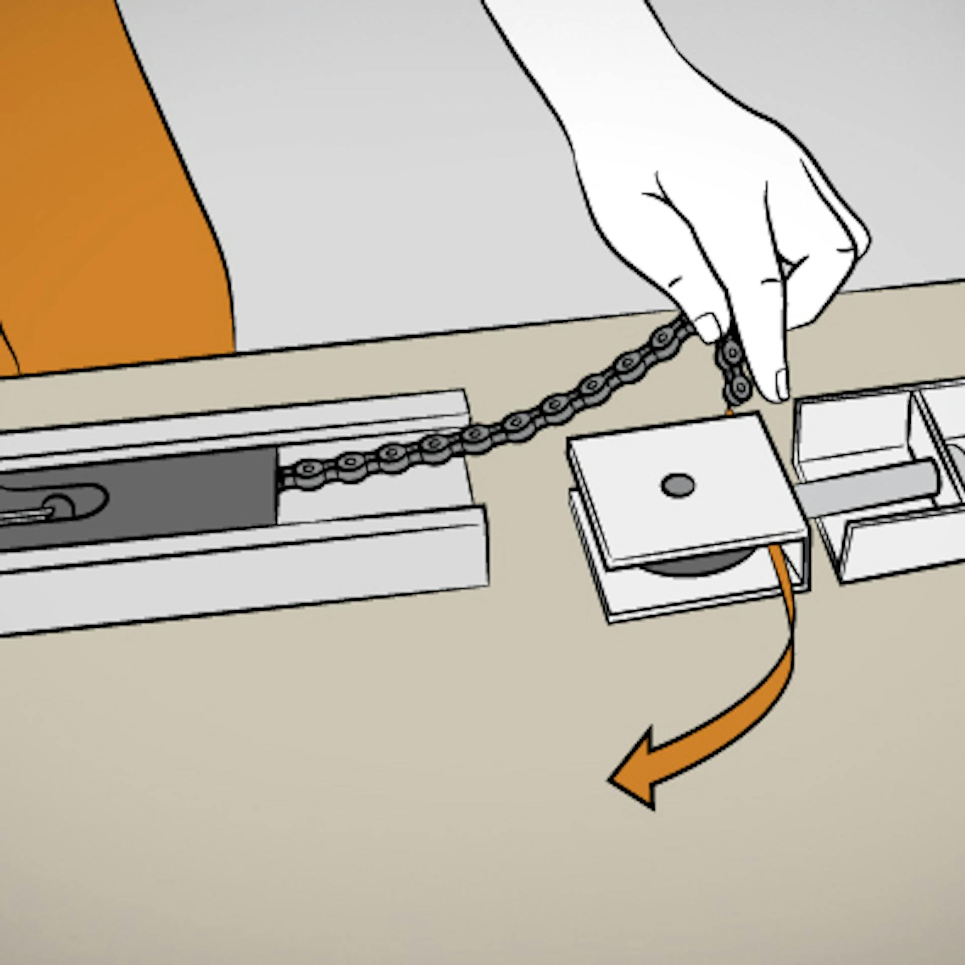 Mann zieht Antriebskette in die Laufschiene ein.