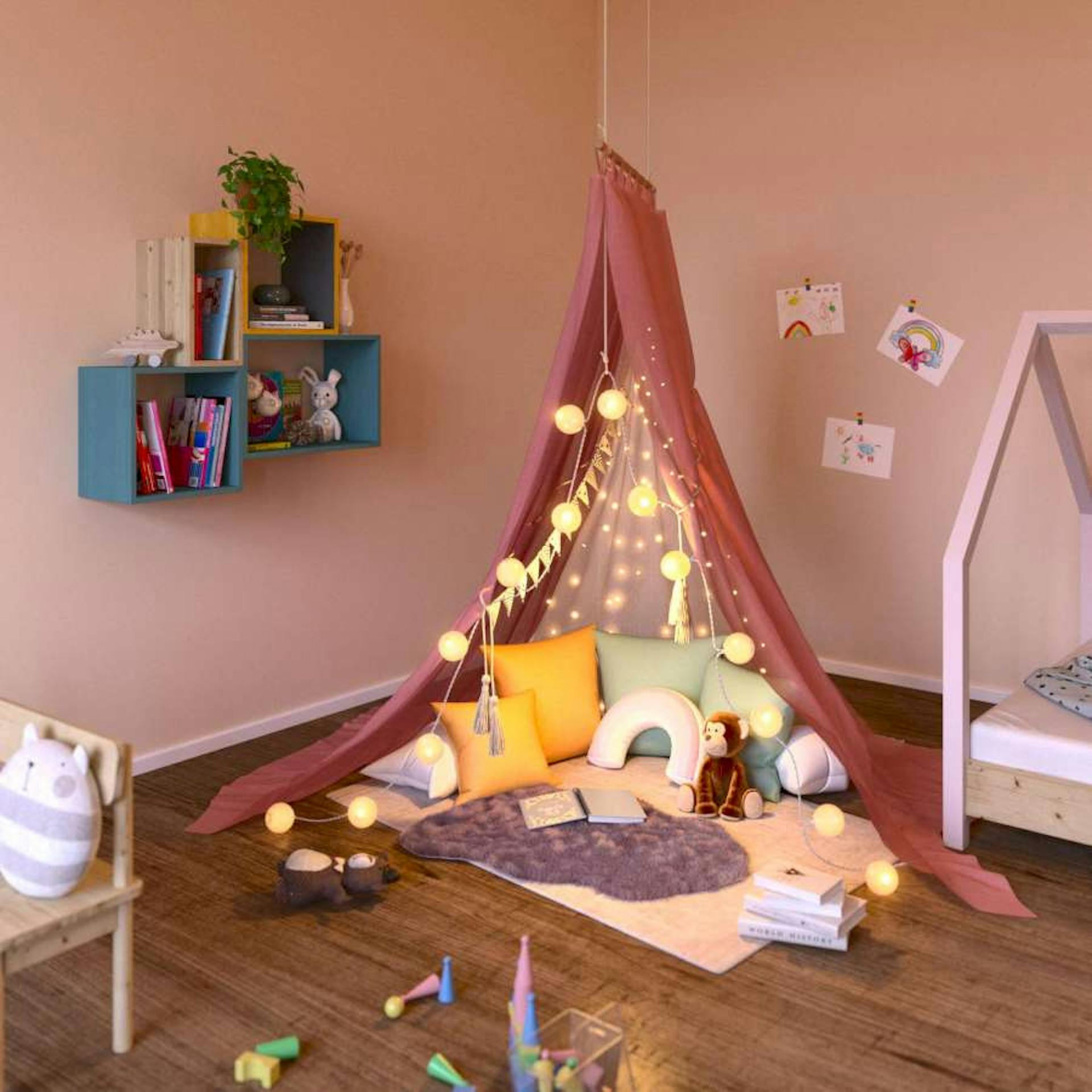 In einem Raum mit rosa Wänden wurde ein Zelt, welches als Lesehöhle dienen soll, in der Ecke aufgezogen.