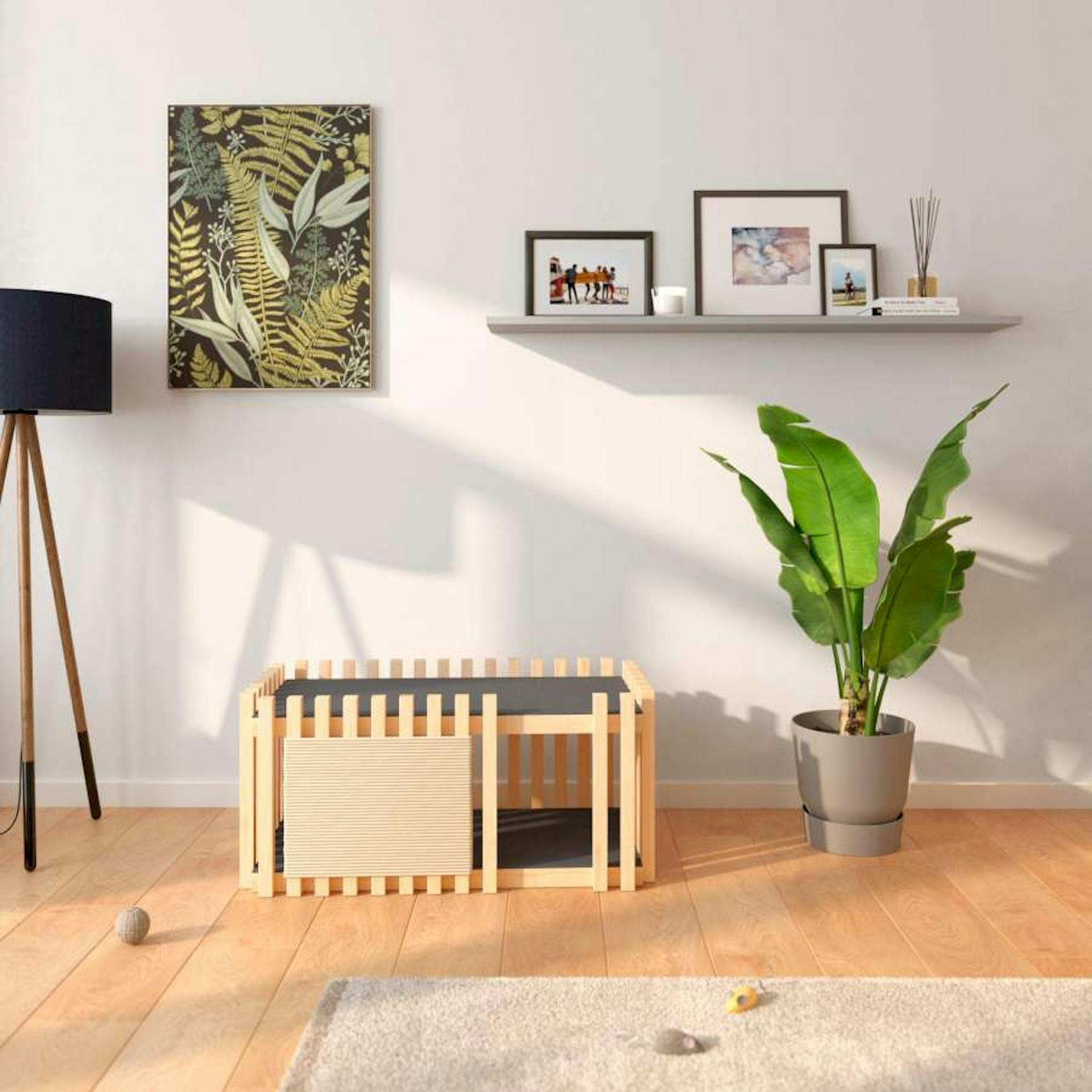 Eine Katzenhöhle vor einer Wohnwand mit Bildern, Lampe und Pflanzen