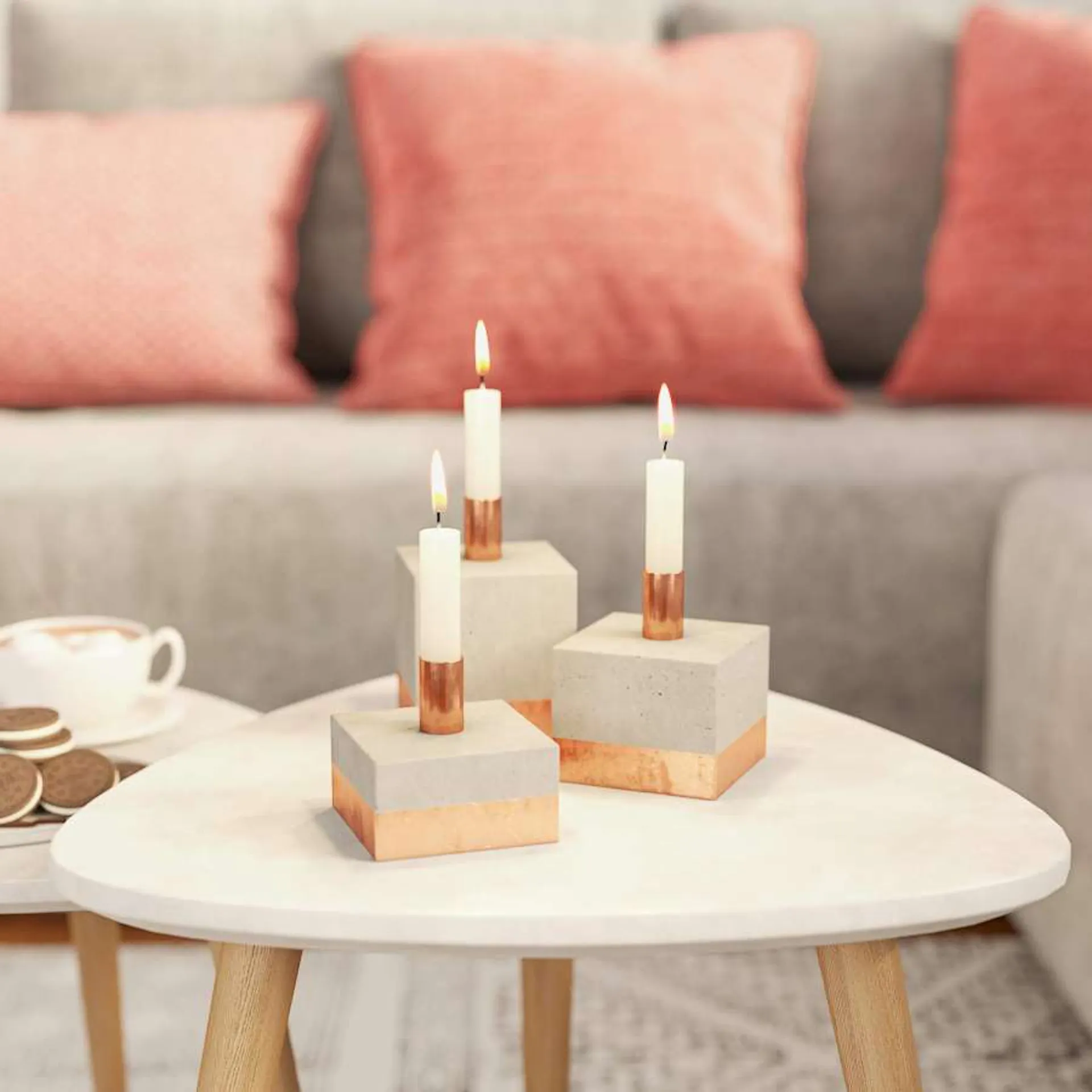 Drei DIY Beton Kupfer Kerzensänder.