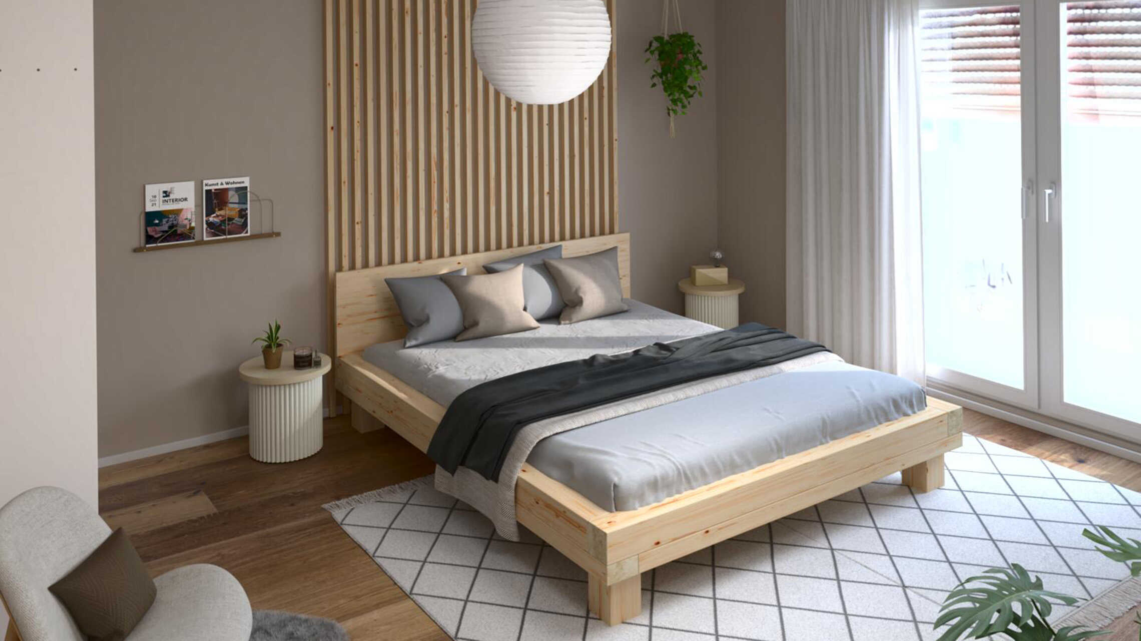 Ein Schlafzimmer mit hellen und gräulichen Wänden im Japandi Stil.