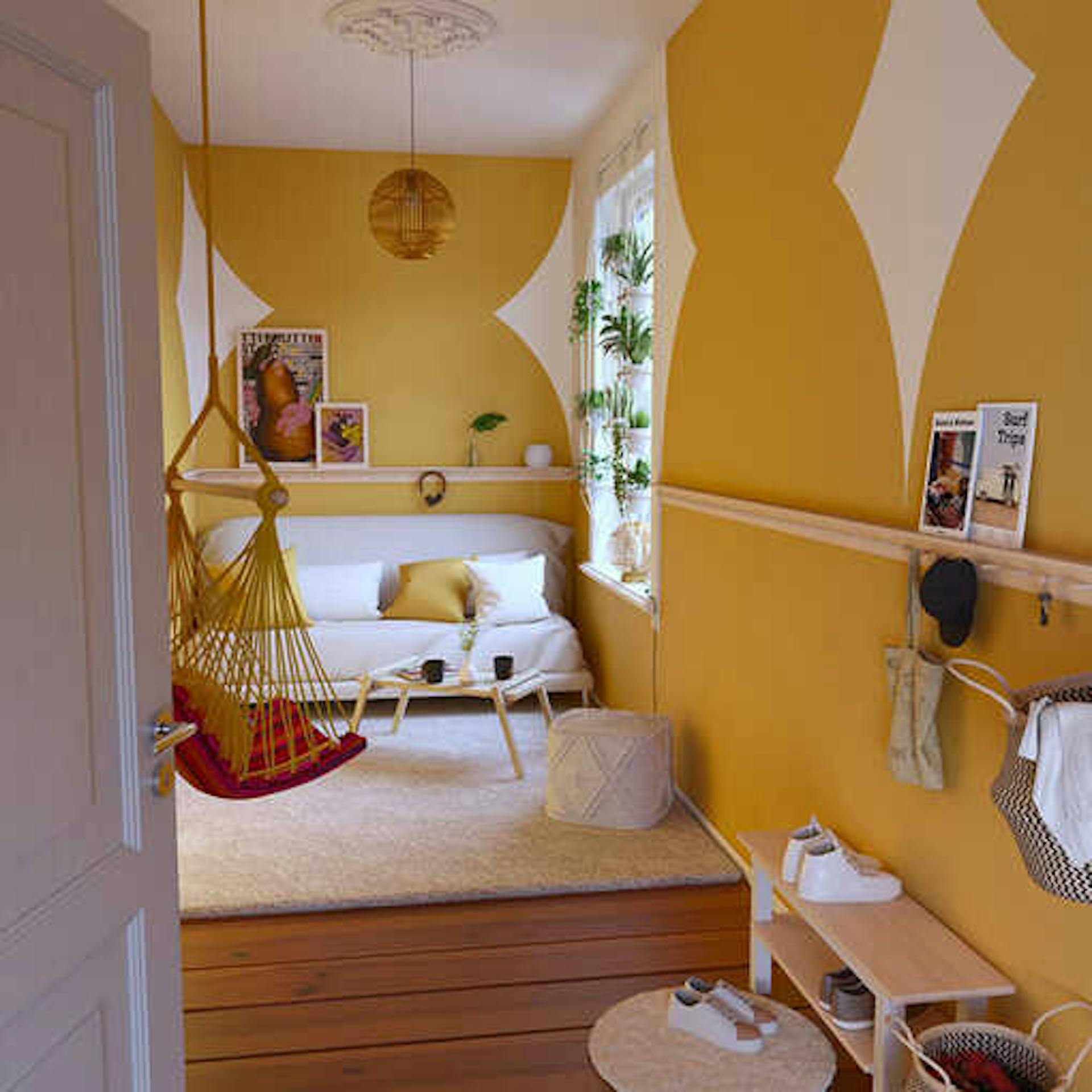 Eine umgebaute Raumecke, mit vielen gelben Farbtönen. einem Hängesessel und einer Couch.