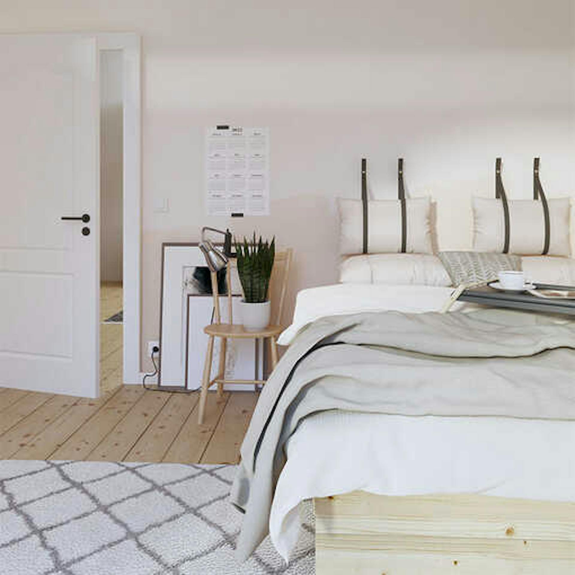 Ein Schlafzimmer in hellen Farbtönen.