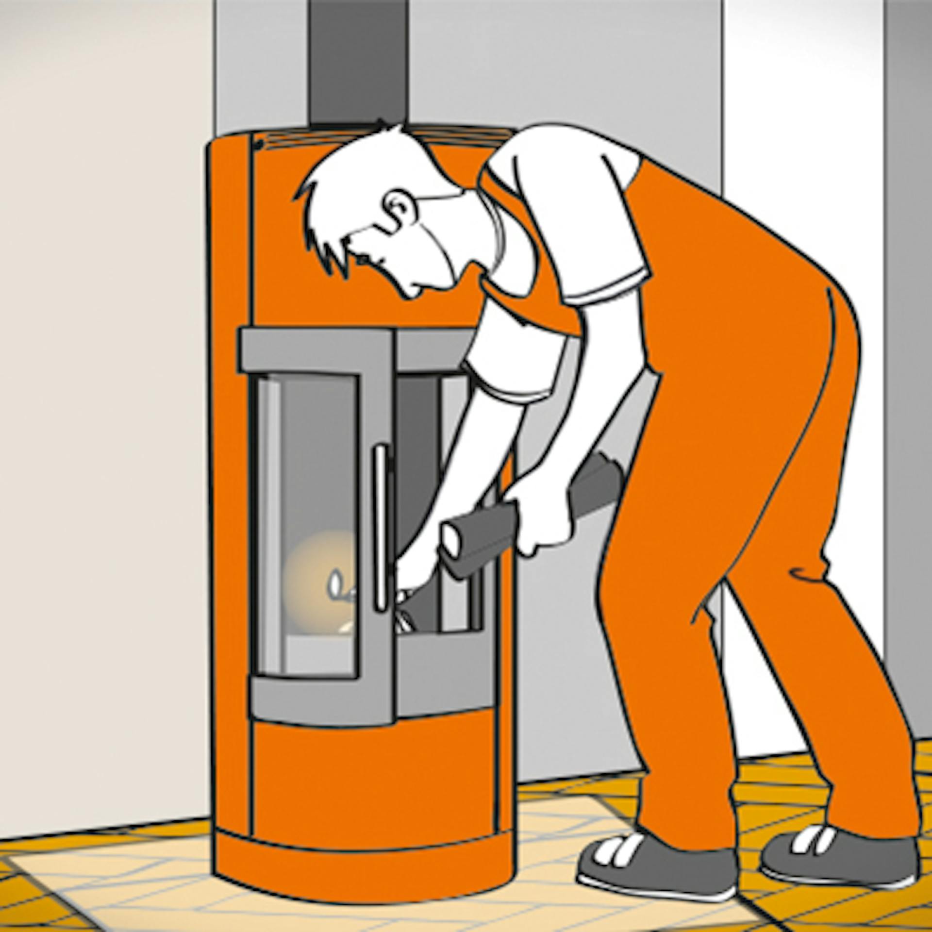 Person legt Anzündholz in den Kaminofen und heizt zum ersten Mal ein.