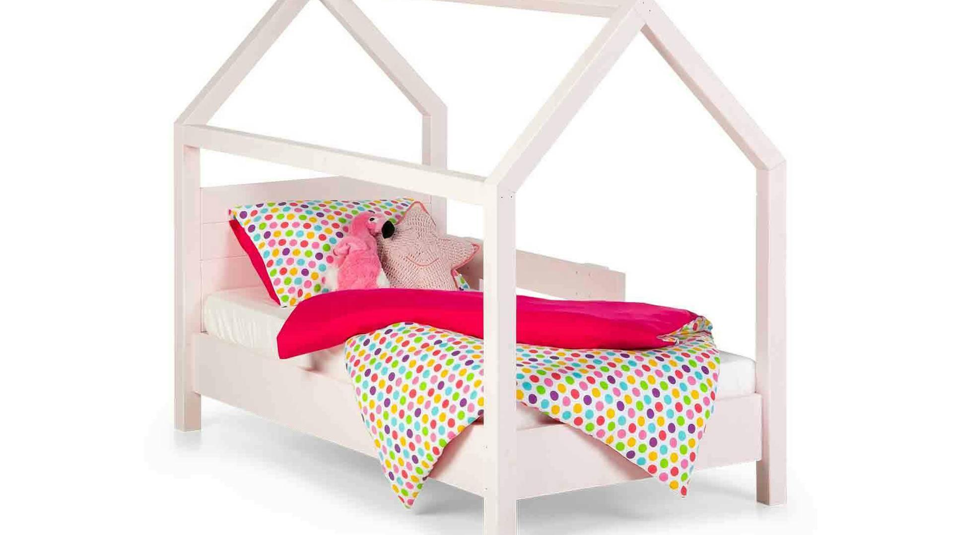 Seitliche Ansicht auf das Kinderbett Moritz in rosa Farben.