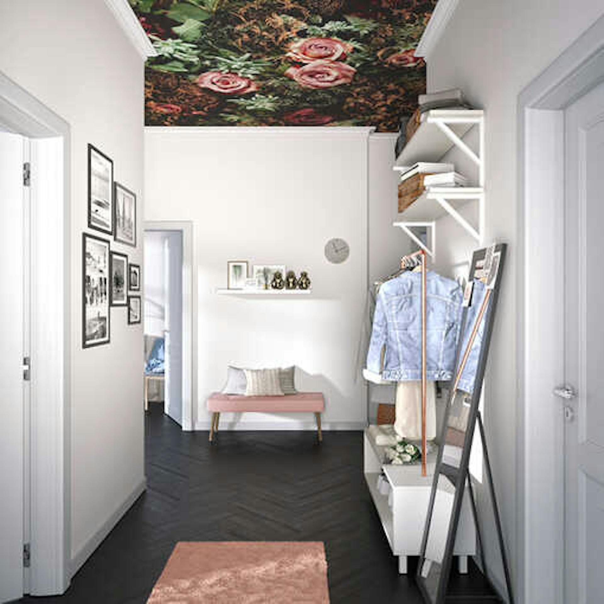 Ein heller, weißer Flur mit moderner Einrichtung und verschieden Dekoelementen.