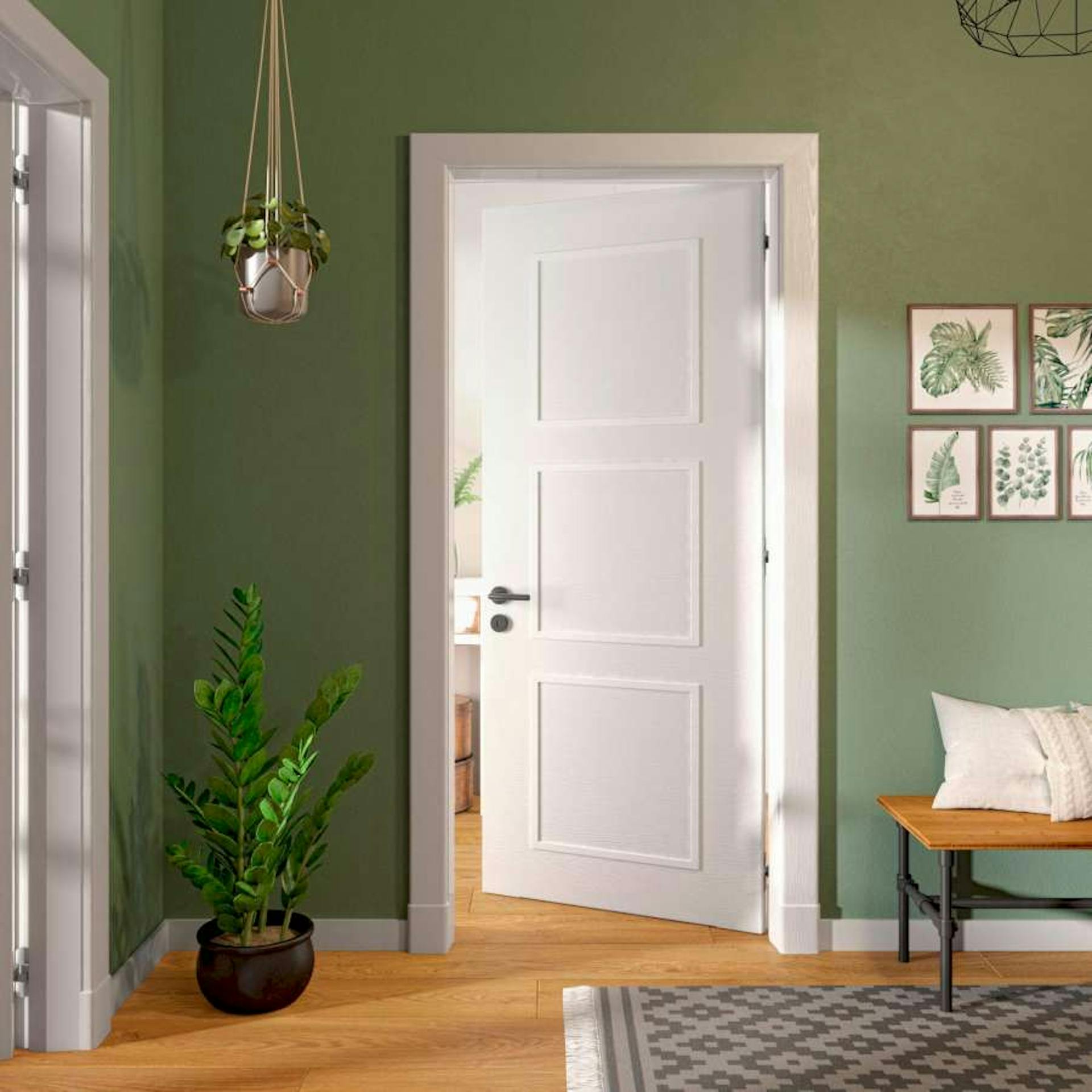 Tür Kassettierung in einem grün gestrichenem Raum.