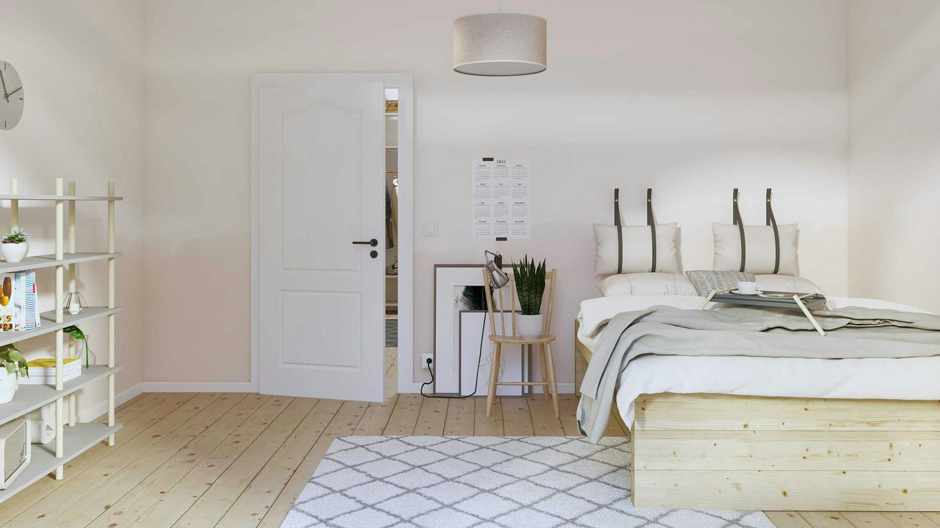 : Ein Schlafzimmer mit beigen Wänden und einer Einrichtung in hellem Holz.