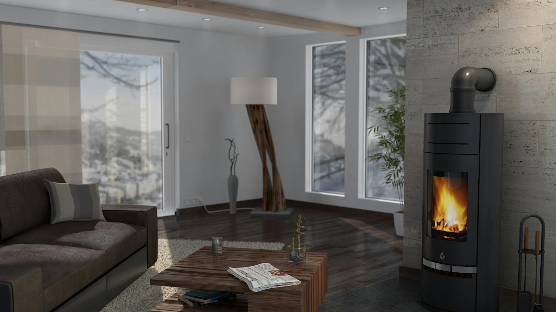 Ein schwarzer Kamin steht in einem dunkel eingerichteten, modernen Wohnzimmer.
