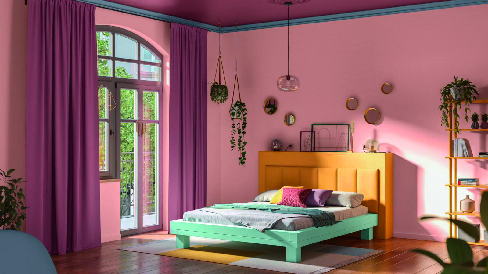 Bett in Wasserblau vor Wand in Quarzrosa