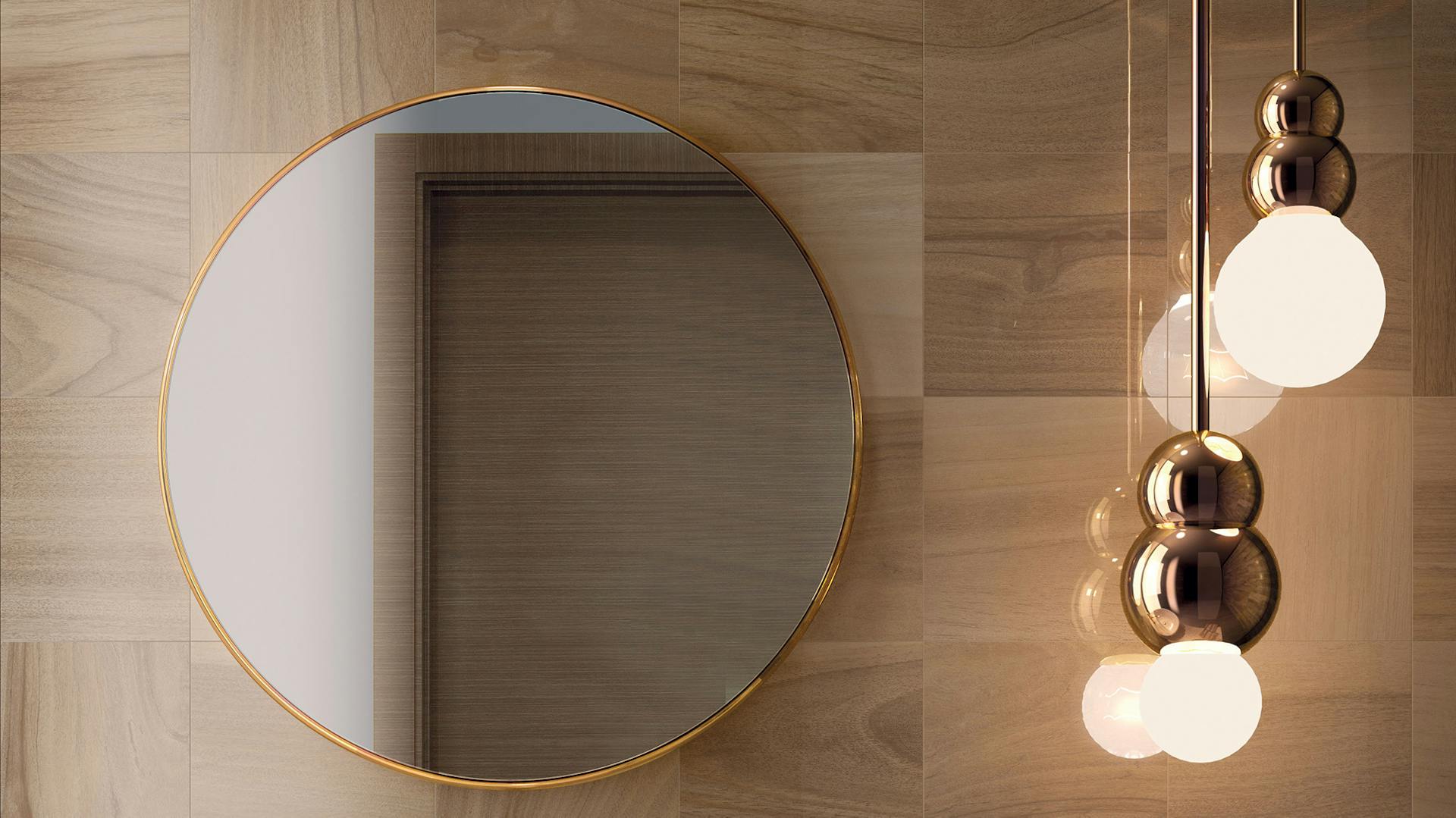 Specchi e lampade a sospensione sopra il lavabo