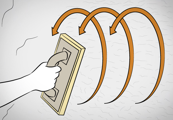 Heimwerker arbeitet Scheibenputzstruktur in Außenwand ein.