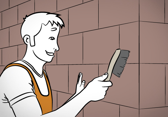 Heimwerker bürstet Hausfassade mit dem Handfeger ab.