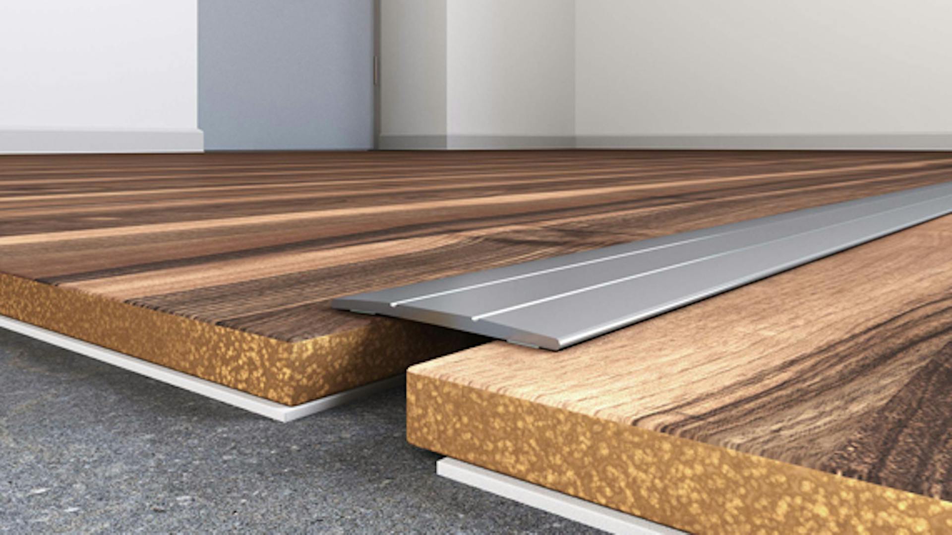 Prechodová lišta z nehrdzavejúcej ocele medzi drevenými podlahovými prvkami