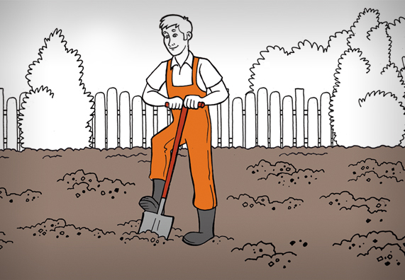 Ásóval ássák fel a földet a leendő gyephez.