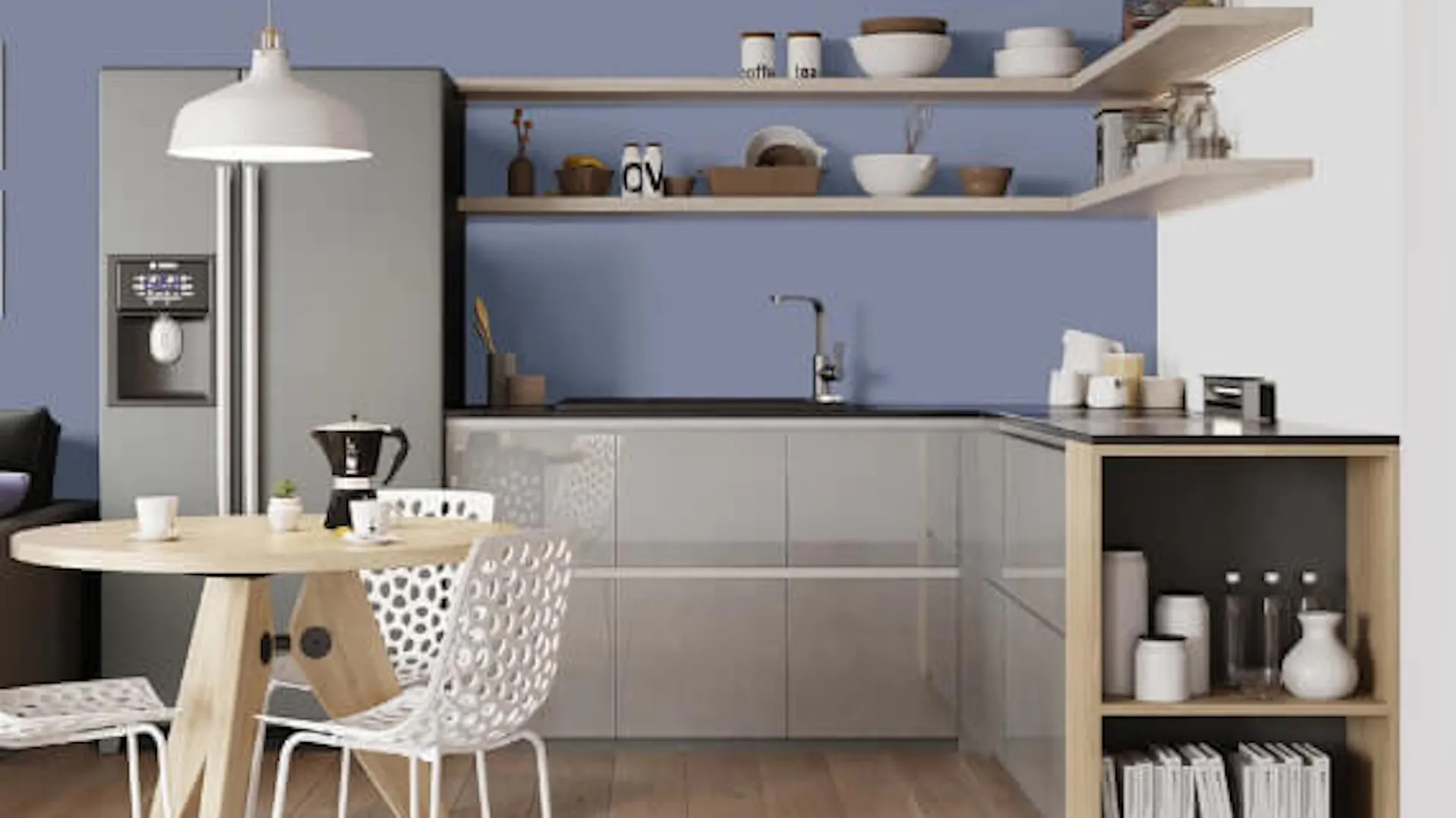 Aneks kuchenny z szarymi meblami na wysoki połysk i srebrną lodówką.