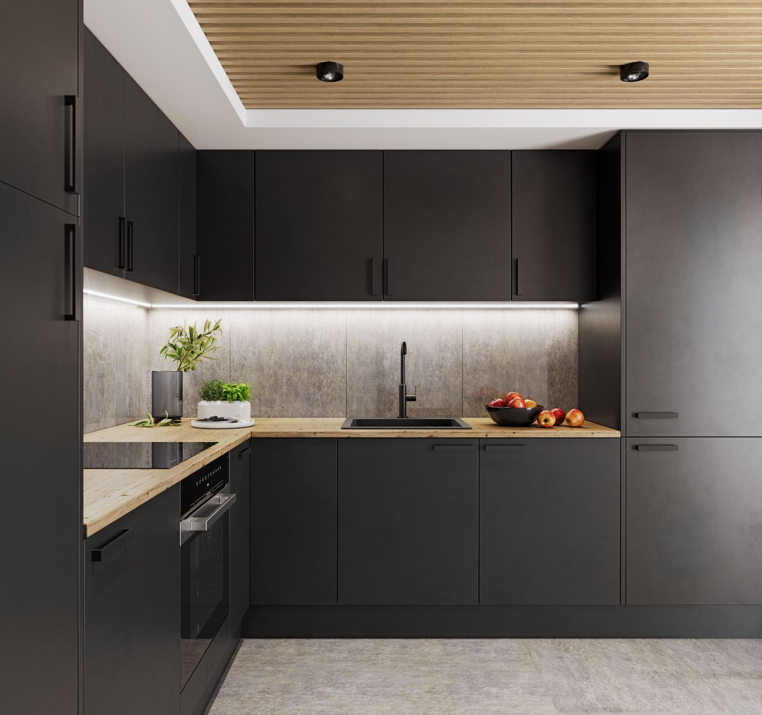 Kuchnia urządzona szafkami z czarnymi frontami i drewnianymi blatami.