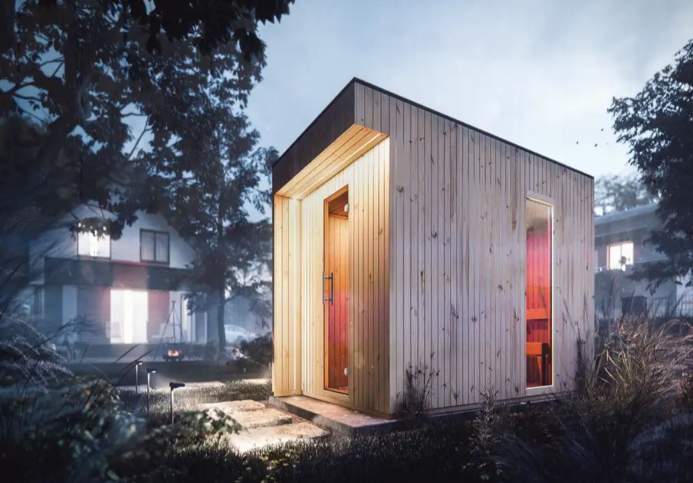 Kleine Sauna mit einer Glastür im Garten